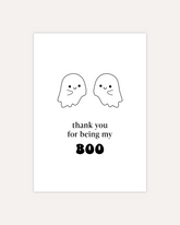 A postcard design showing two adorable ghost drawings and some text saying "thank you for being my boo". The design is shown on a beige background.